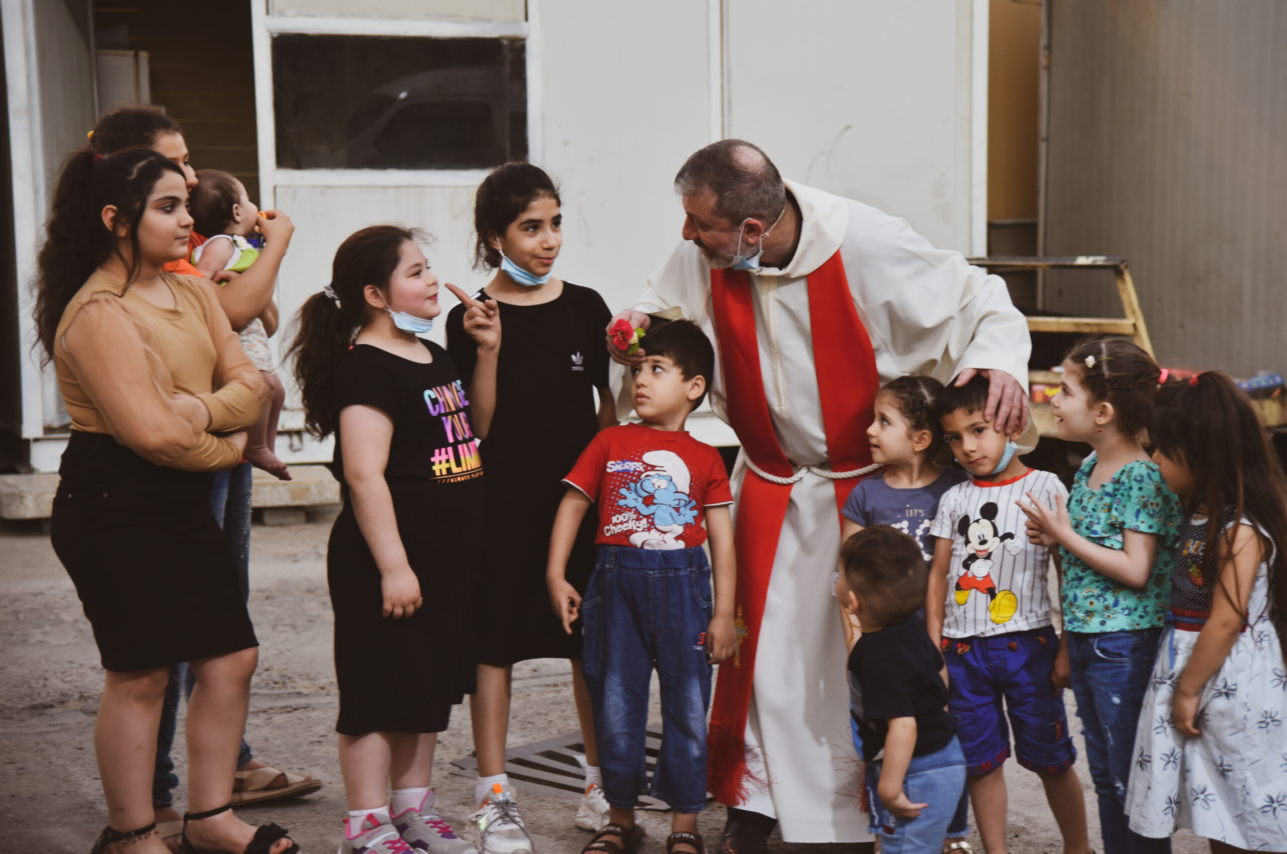 Post-Service-Fr.-Faiz-talking-to-childeren